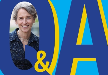 Graphic letters Q and A with photo of blonde woman inside the Q.