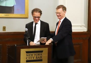 Bernard E. Harcourt receives his award at the July 25 ceremony in New York City.