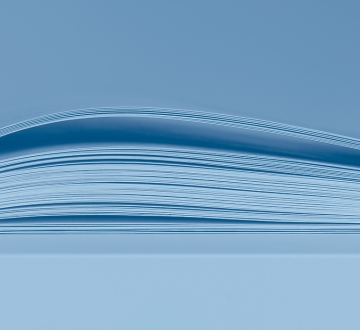Blue image of an open book