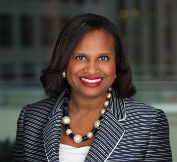 New York City Bar president Sheila Boston in a striped blazer and chunky necklace