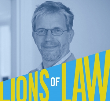 Lions of Law photo with bearded man in glasses