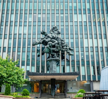 Exterior of Jerome L. Greene Hall featuring the sculpture Bellerophon Taming Pegasus