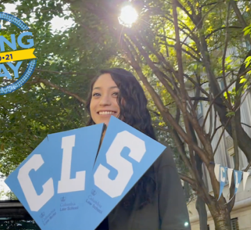 Student holding signs that say "C" "L" "S". Logo that reads Giving Day 10-20-21