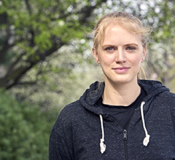Woman wearing a black hoodie