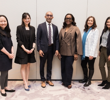 Five alumnae and Dean Abebe