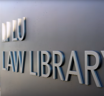 Sign that reads "Li Lu Law Library"