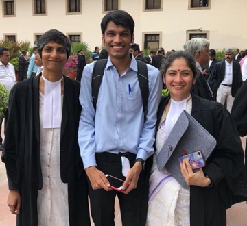 Menaka Guruswamy, Kumar Vardhman (petitioner), and Arundhati Katju ’17 LL.M. before oral arguments in July.