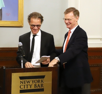 Bernard E. Harcourt receives his award at the July 25 ceremony in New York City.