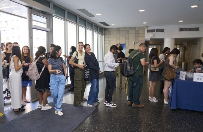 Students line up to register at orientation