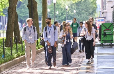 LLM students walking on campus