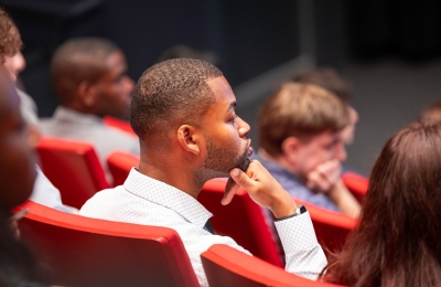 Male student listening to orientation