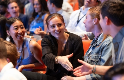 Students shaking hands during orientation 