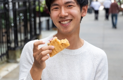 Young man with food truck food