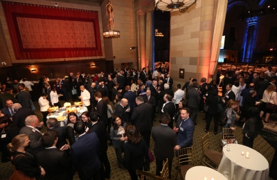 Photo from above of guests standing at Winter Luncheon