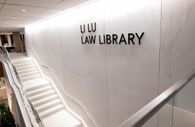 Staircase under "Li Lu Law Library" signage