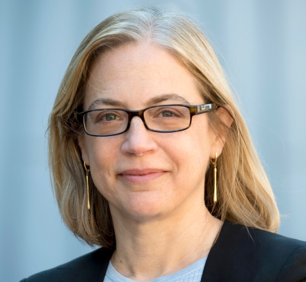 Columbia Law Professor Gillian Metzger in glasses and light blue sweater and dark blazer
