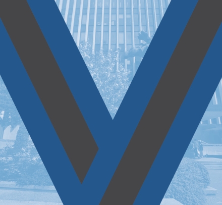 The blue ribbon of the Medal for Excellence superimposed on an image of the Law School