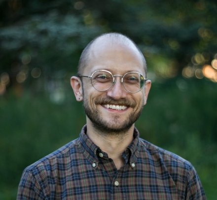 Man in glasses and plaid shirt