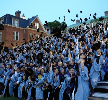 Columbia Law graduates toss their velvet tams in the air