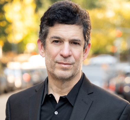 Columbia Law Professor Michael Heller in dark shirt and blazer