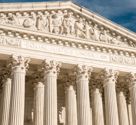 The facade of the U.S. Supreme Court building with “Equal Justice Under the Law“ visible at the top