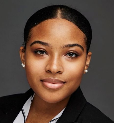 Headshot photo of Amina Stone-Taylor
