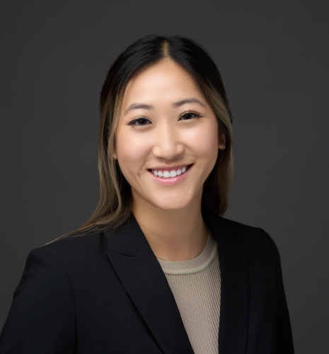 Headshot of a woman wearing a black blazer