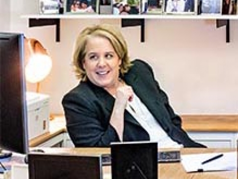 Roberta "Robbie" Kaplan sitting and her desk in her office