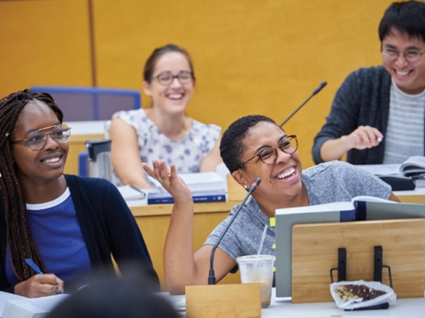 Students laughing and smiling during class