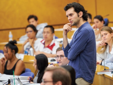 TA in classroom with students