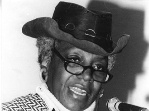 Flo Kennedy speaking at a mic. Credit: Schlesinger Library, Radcliffe Institute, Harvard University