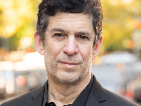 Columbia Law Professor Michael Heller in dark shirt and blazer