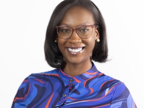 Woman in glasses and colorful blouse