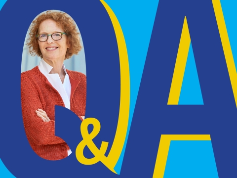 Women in white blouse and red sweater embedded in a graphic