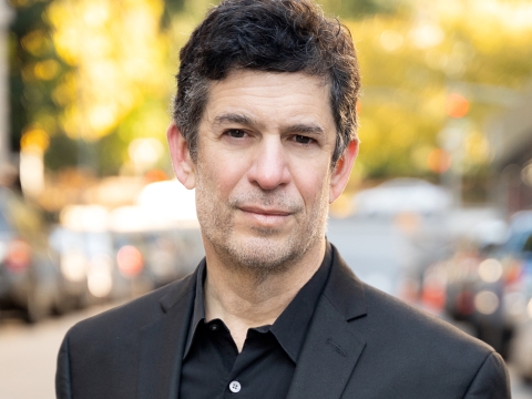 Columbia Law Professor Michael Heller in dark shirt and blazer