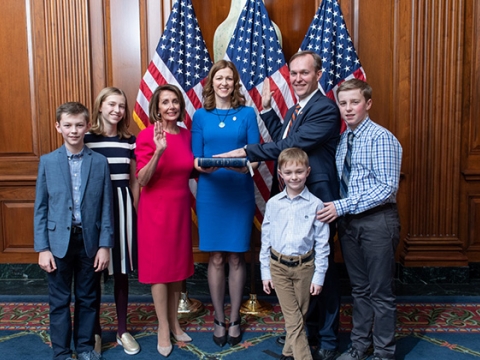 Ben McAdams and his family at his swearing-in with Nancy Pelosi. Courtesy official House photographer.
