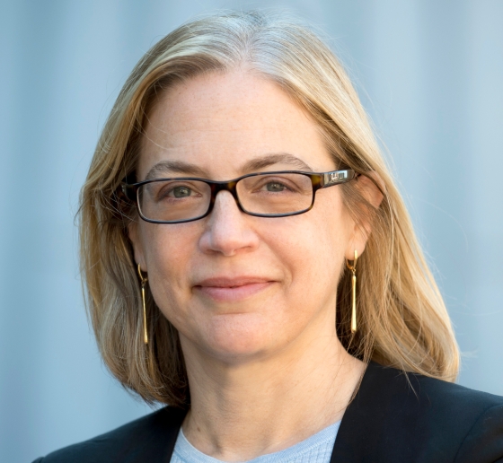 Columbia Law Professor Gillian Metzger in glasses and light blue sweater and dark blazer