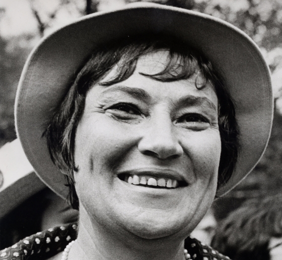 Black and white headshot of Bella Abzug smiling 