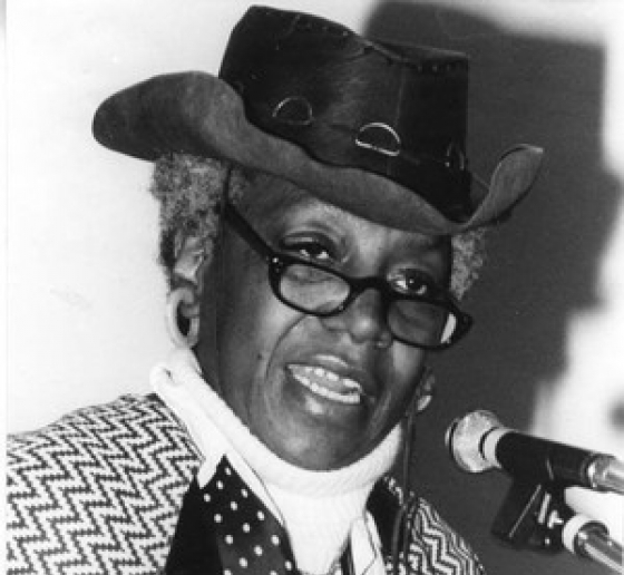 Flo Kennedy speaking at a mic. Credit: Schlesinger Library, Radcliffe Institute, Harvard University