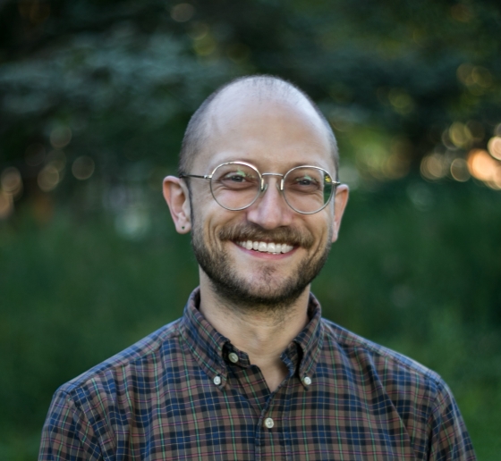 Man in glasses and plaid shirt