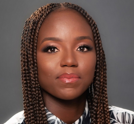 Woman with dark braids and red lipstick