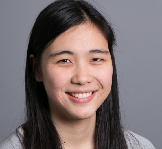 Smiling woman with long black hair