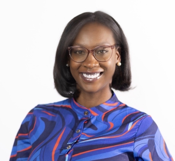 Woman in glasses and colorful blouse