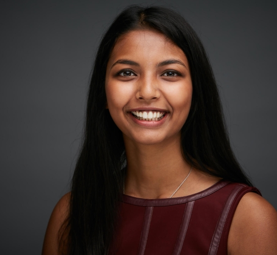 Smiling woman with long black hair