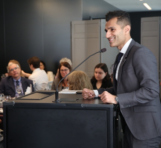 Man standing at a podium