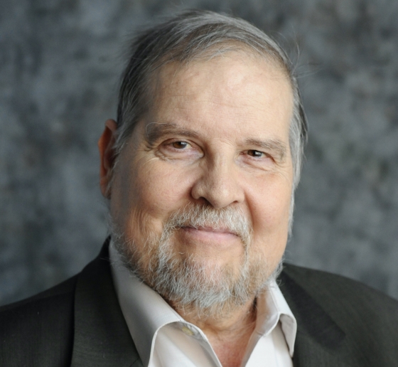 Man with beard in suit jacket