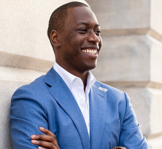 Man in blue jacket and white shirt