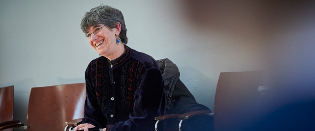 Professor Susan Sturm smiles while teaching a lecture.
