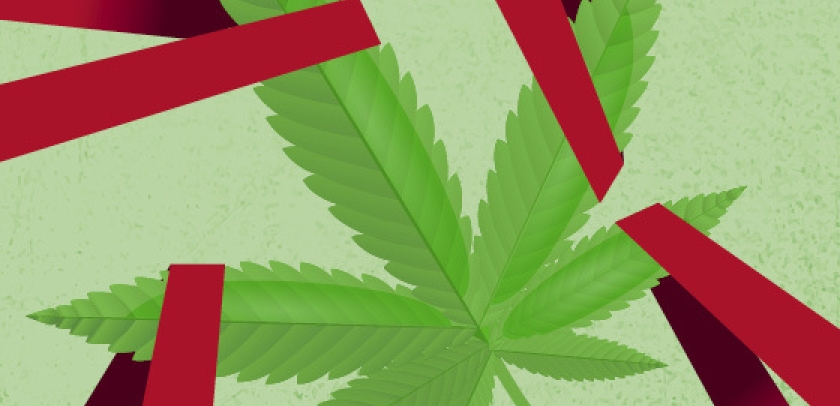 A marijuana leaf wrapped in red tape