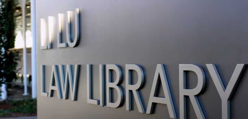 Sign that reads "Li Lu Law Library"